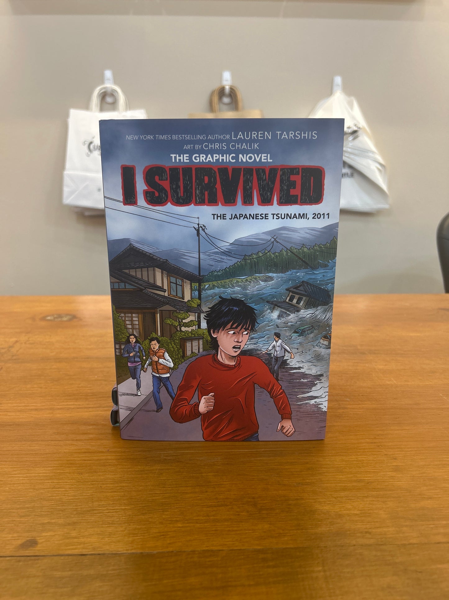 I SURVIVED THE JAPANESE TSUNAMI, 2011 (GRAPHIX) by: Lauren Tarshis