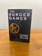 HUNGER GAMES, HARDBACK by: Suzanne Collin’s