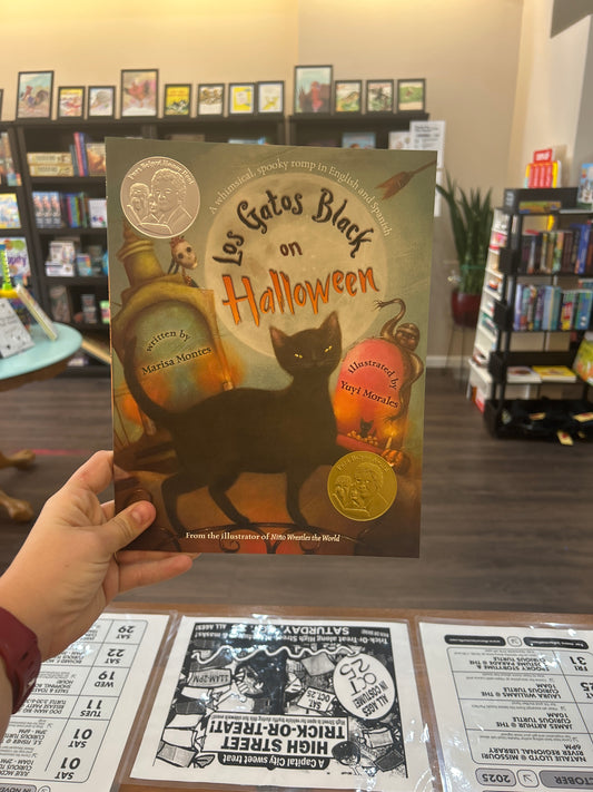 Los Gatos Black on Halloween by: Marissa Montes