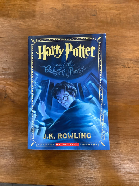 HARRY POTTER AND THE ORDER OF THE PHOENIX by: J.K. Rowling