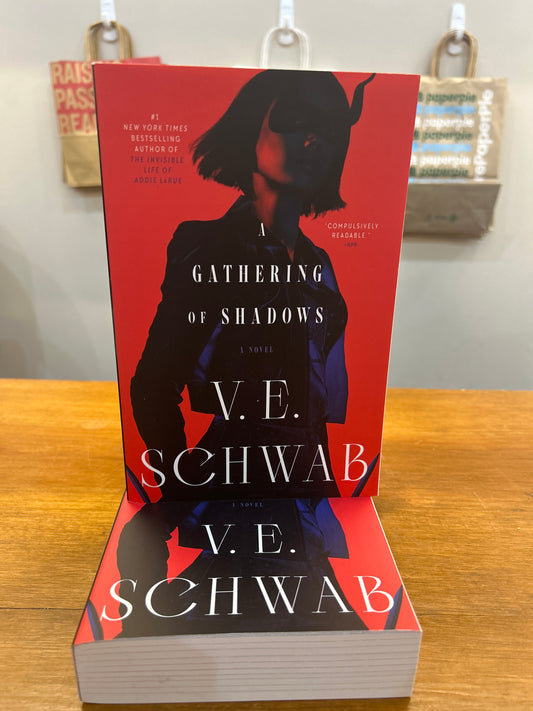 A Gathering of Shadows by: V.E. Schwab (Book 2)