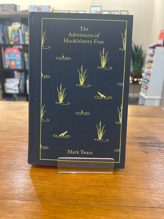 The Adventures of Huckleberry Finn by: Mark Twain
